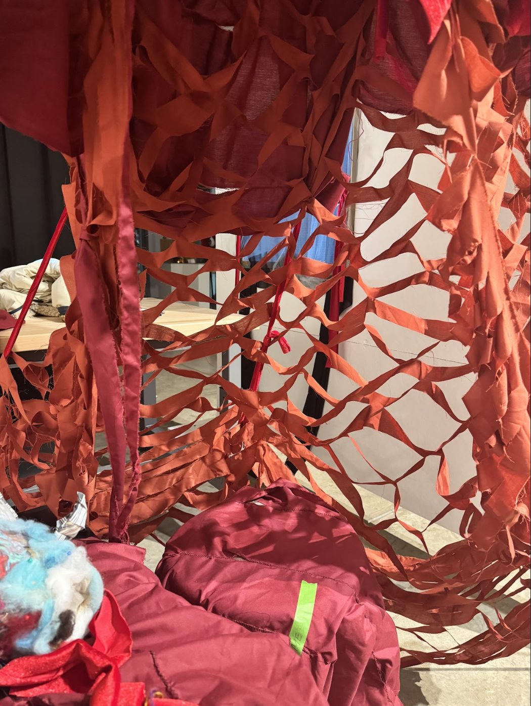 Red fabric and netting booth interior